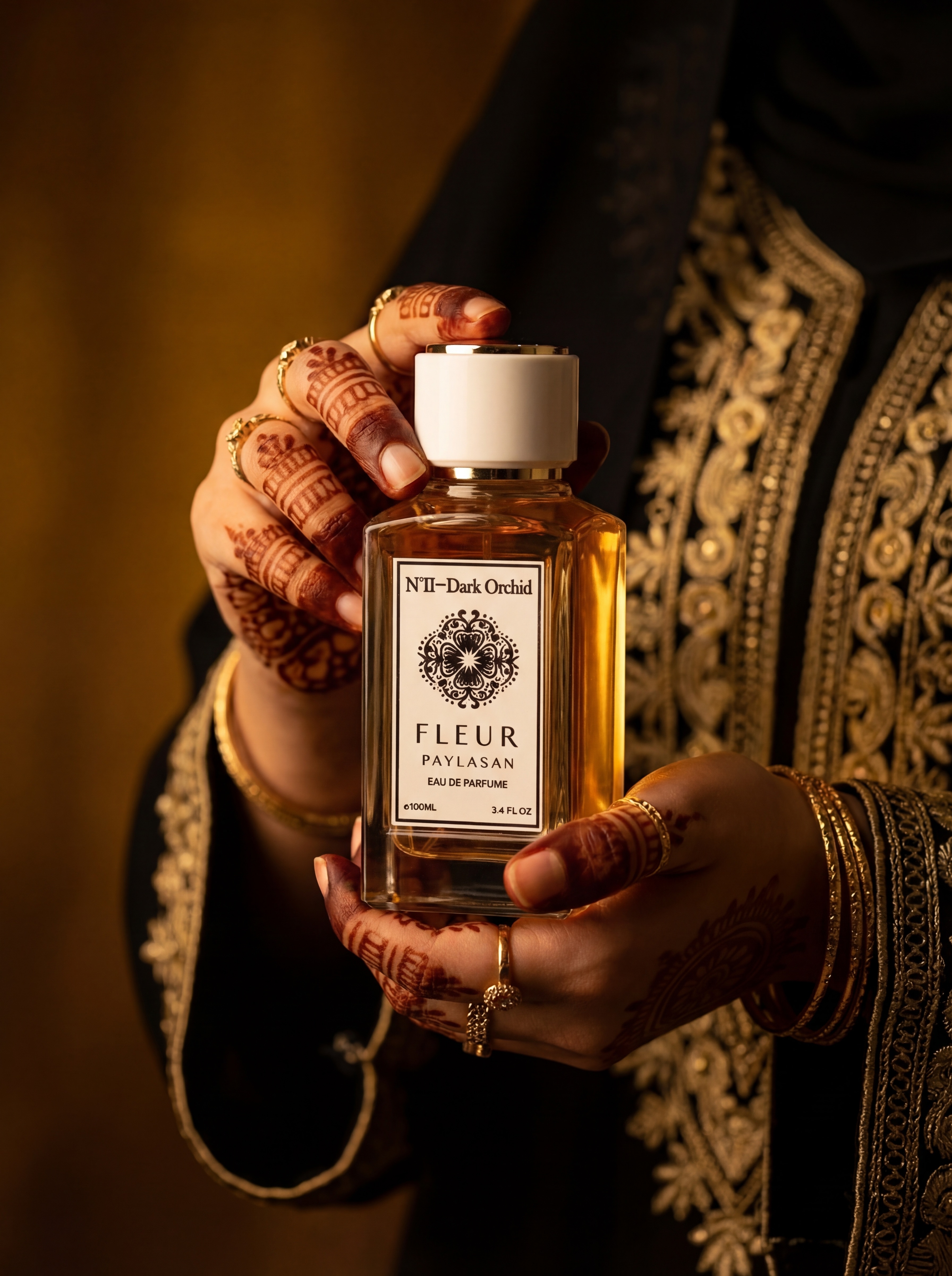 Henna hands holding Dark Orchid perfume with black abaya