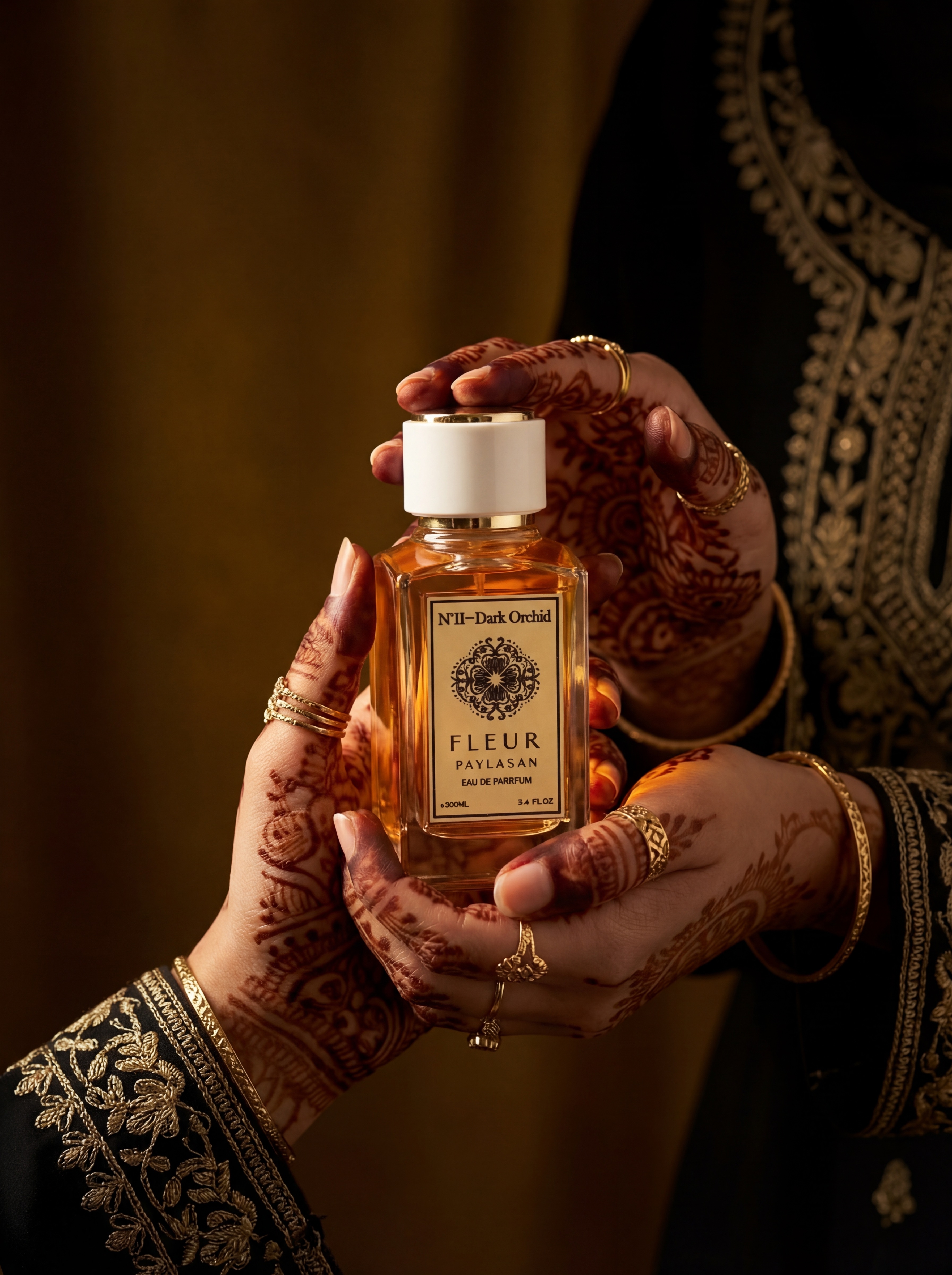 Close-up of henna hands with Dark Orchid perfume